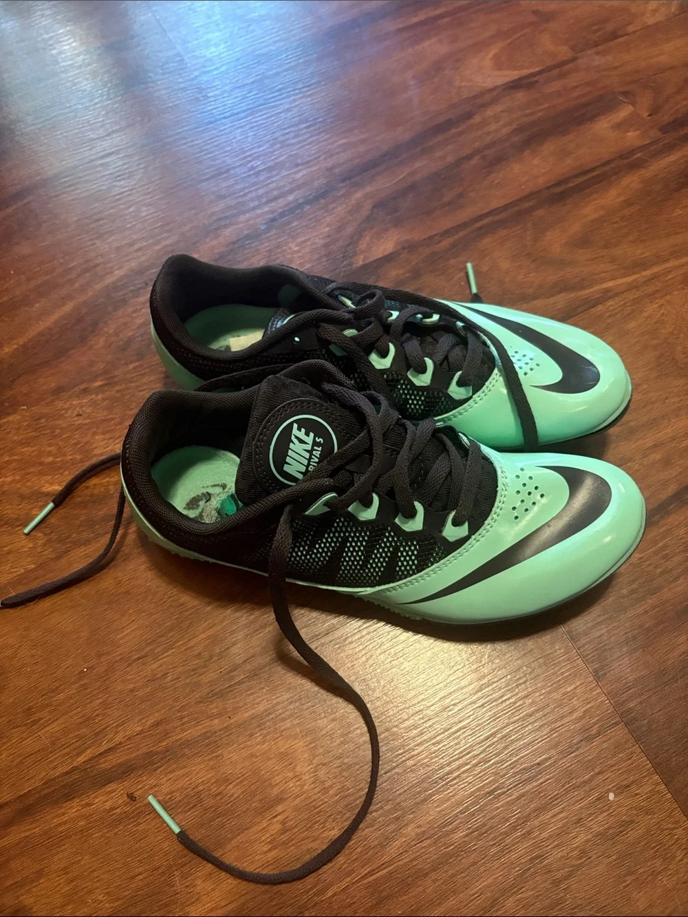 Nike Mint Green and Black track shoes